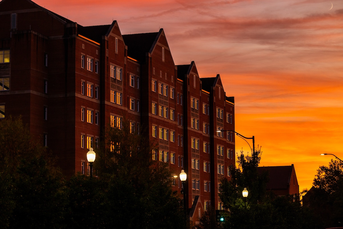 image of a residence hall at sunset