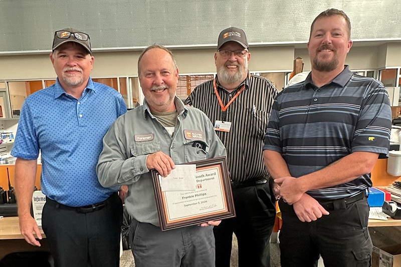 Pictured left to right: Derek Bailey (Assistant Vice Chancellor of Facilities Operations), Employee of the Month Frankie Phillips, Assistant Director of Maintenance and Repair Wally Beets, and Director of Maintenance and Repair Wayne Parsons