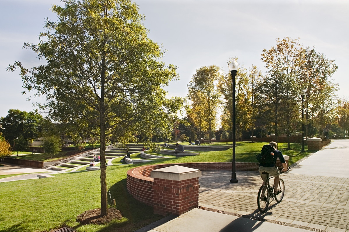 image of cyclist on the Johnson Ward Pedestrian Mall near the Humanities amphitheatre
