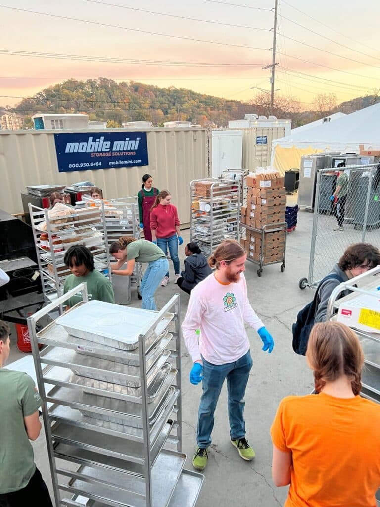 volunteers assist with food recovery after an event on UT Knoxville campus