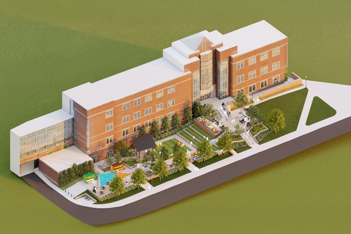 Isometric architectural rendering of a large brick building with a multi-level outdoor plaza featuring green lawns, trees, outdoor seating, and food trucks.